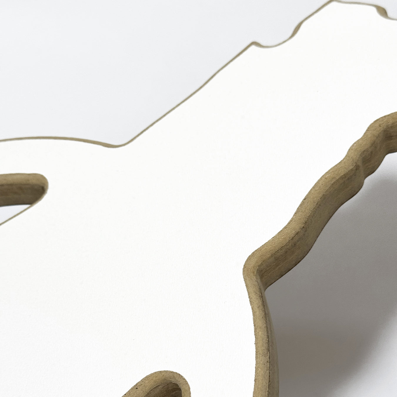 Close-up of a decorative mirror with wavy edge on a white background - 5 Close-up of a decorative mirror with wavy edge on a white background - 5