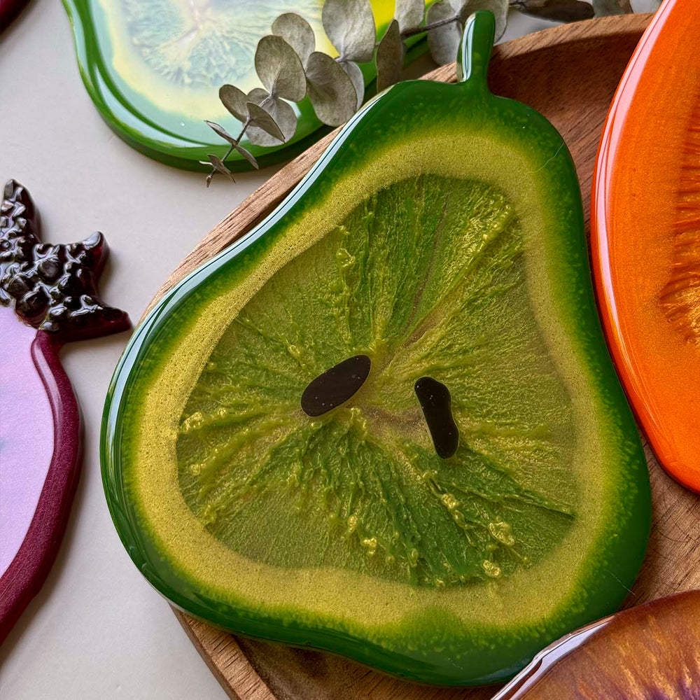 Fruit-shaped epoxy resin coasters made by workshop participants 5
