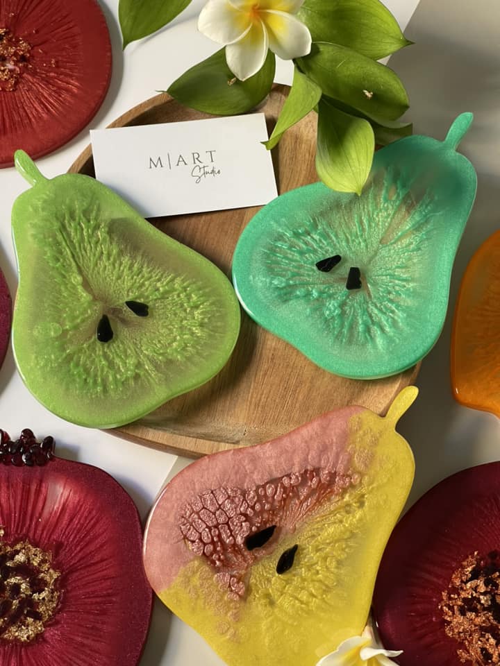 Fruit-shaped epoxy resin coasters made by workshop participants 11
