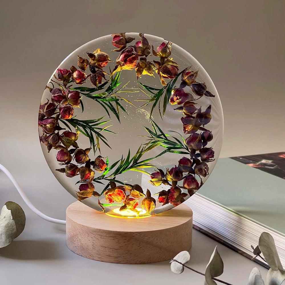 Epoxy resin lamps with dried flowers made by participants 5