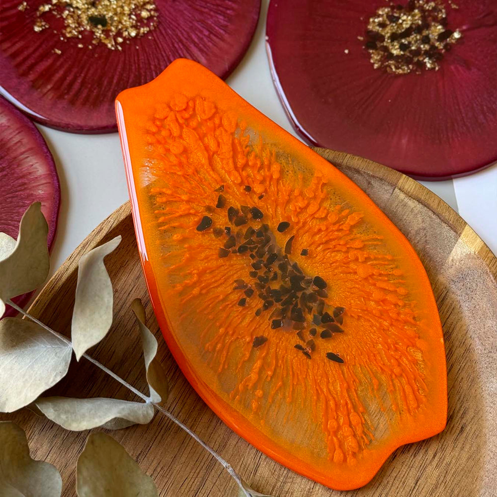 Fruit-shaped epoxy resin coasters made by workshop participants 14