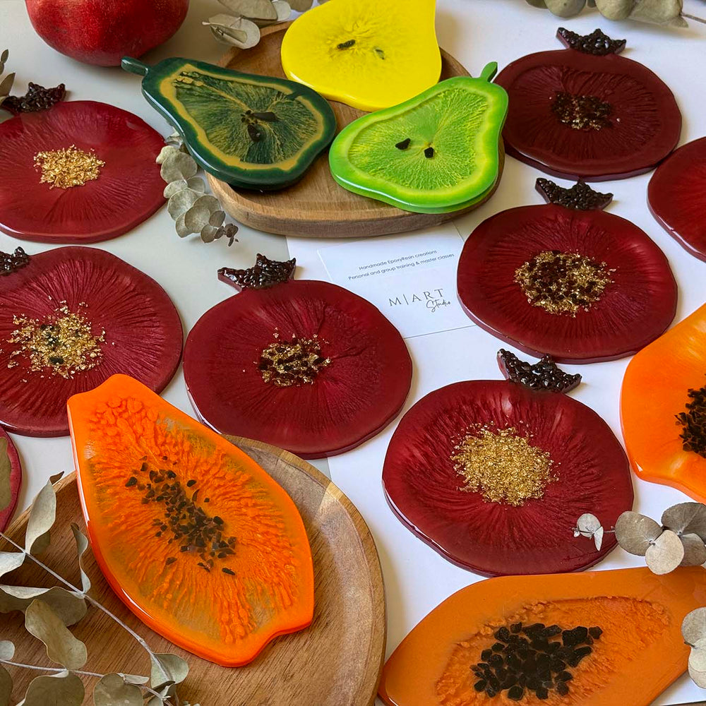 Fruit-shaped epoxy resin coasters made by workshop participants 4