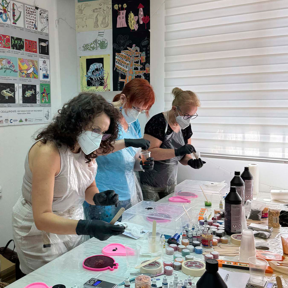 Fruit-shaped epoxy resin coasters made by workshop participants 6