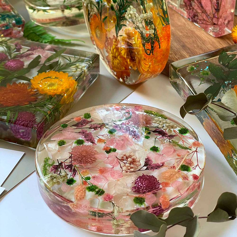 Epoxy resin lamps with dried flowers made by participants 14