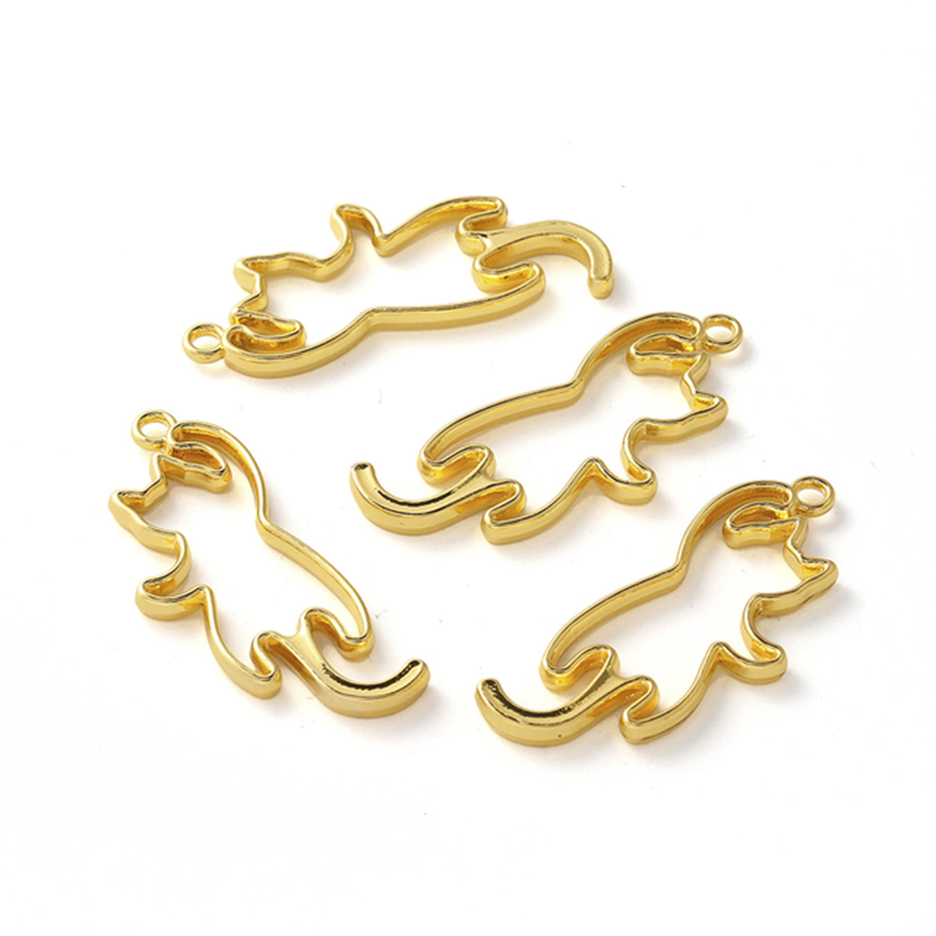 Golden metal shapes of cats